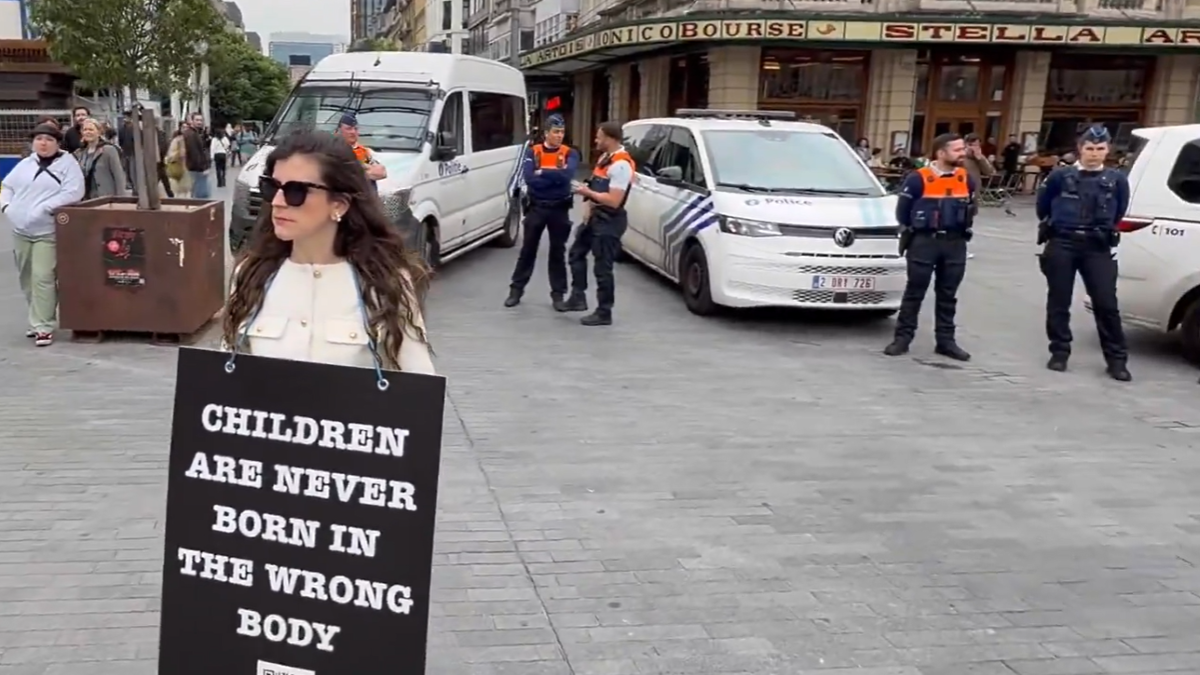 ‘Actions Of An Authoritarian Regime’: Duo Arrested In Belgium For Signs Defying Transgenderism