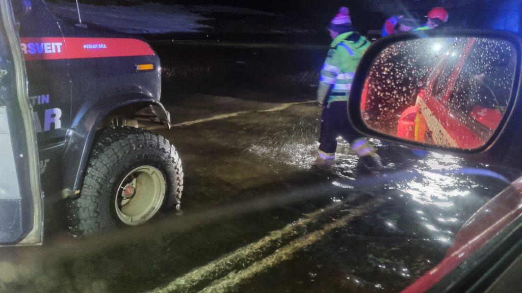 Tourists Rescued After Cars Submerged on Flooded Road