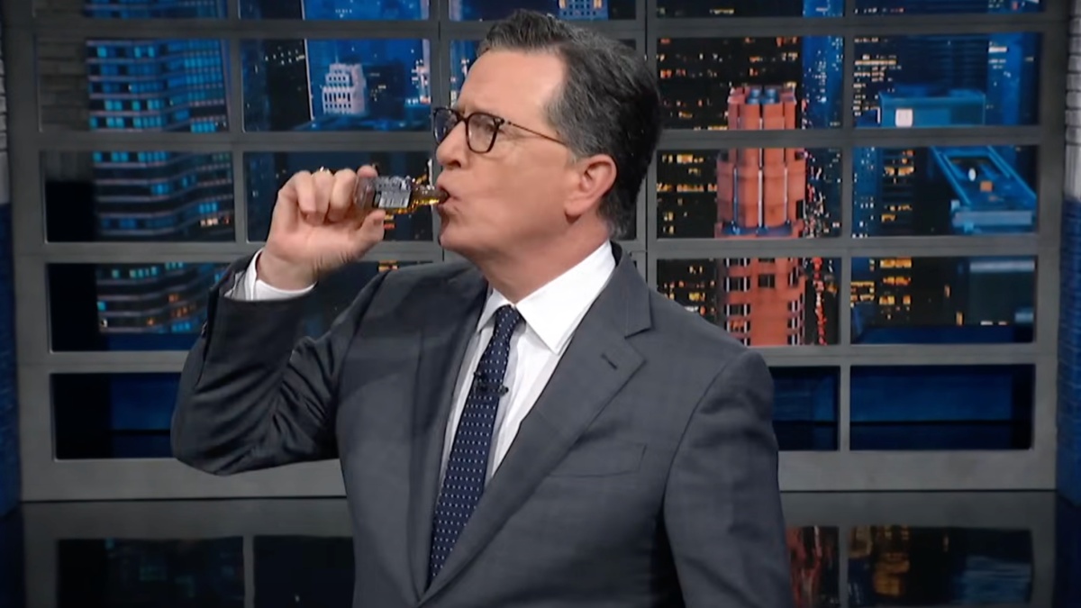 Stephen Colbert Takes a Swig of Jack Daniel’s While Dishing on Recession Indicators | Video